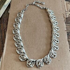 VINTAGE CORO  SWIRLY  SILVERTONE Necklace, marked